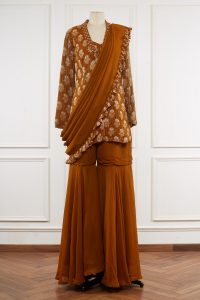 Rust orange floral print jacket sharara set by Nitya Bajaj (1)